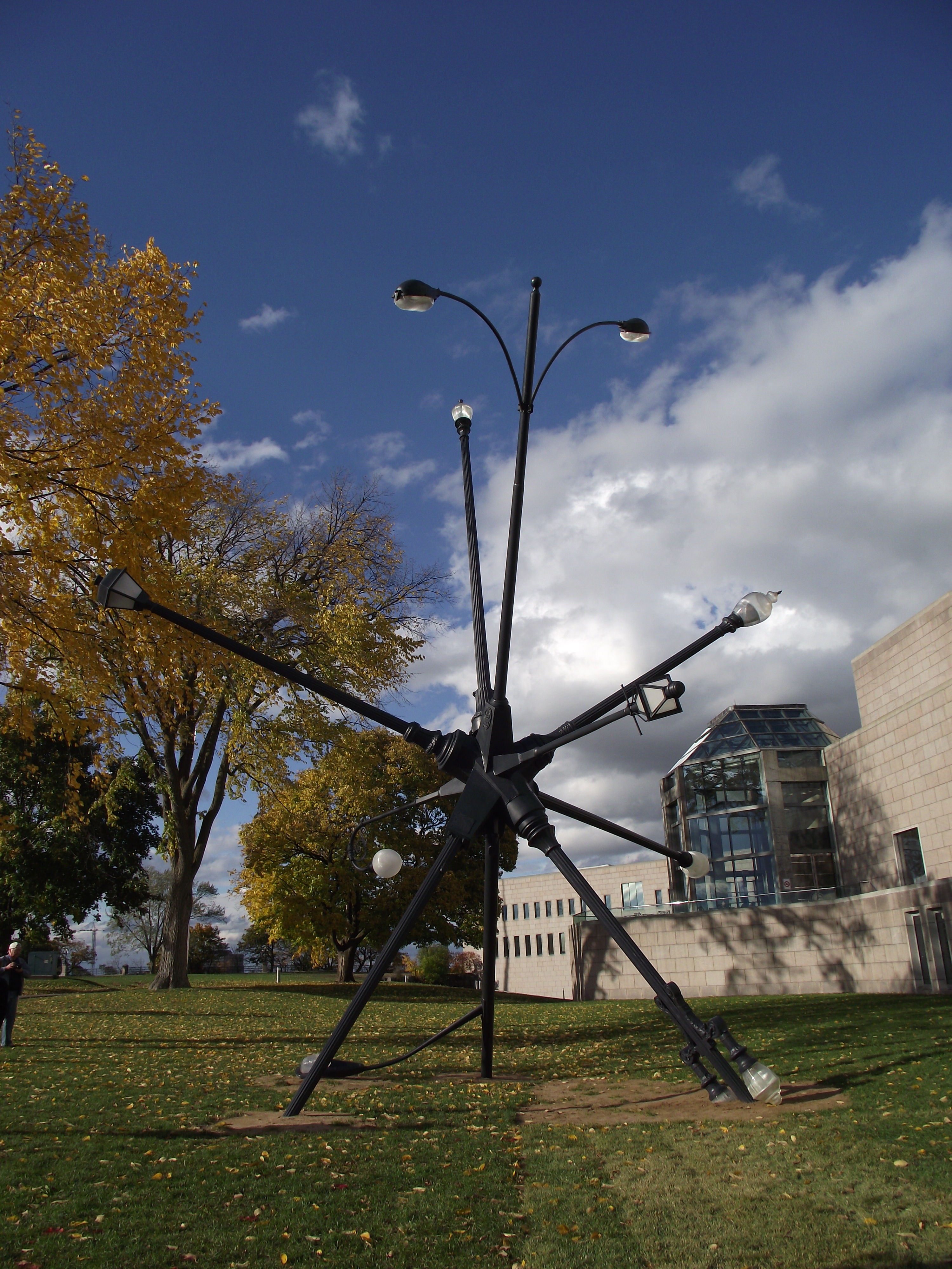 The Sentinels of Time sculpture: black metal poles fanning out of the ground
